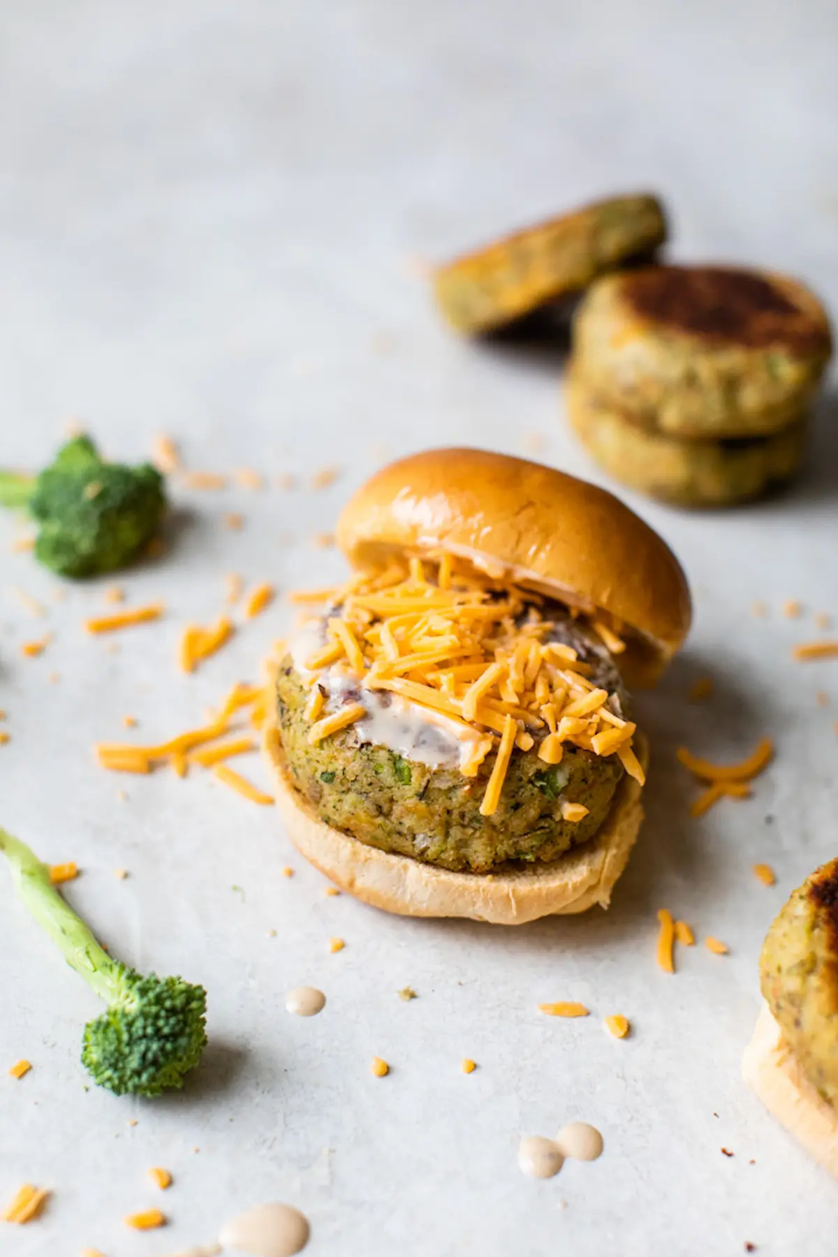 veggie burgers topped with shredded cheese