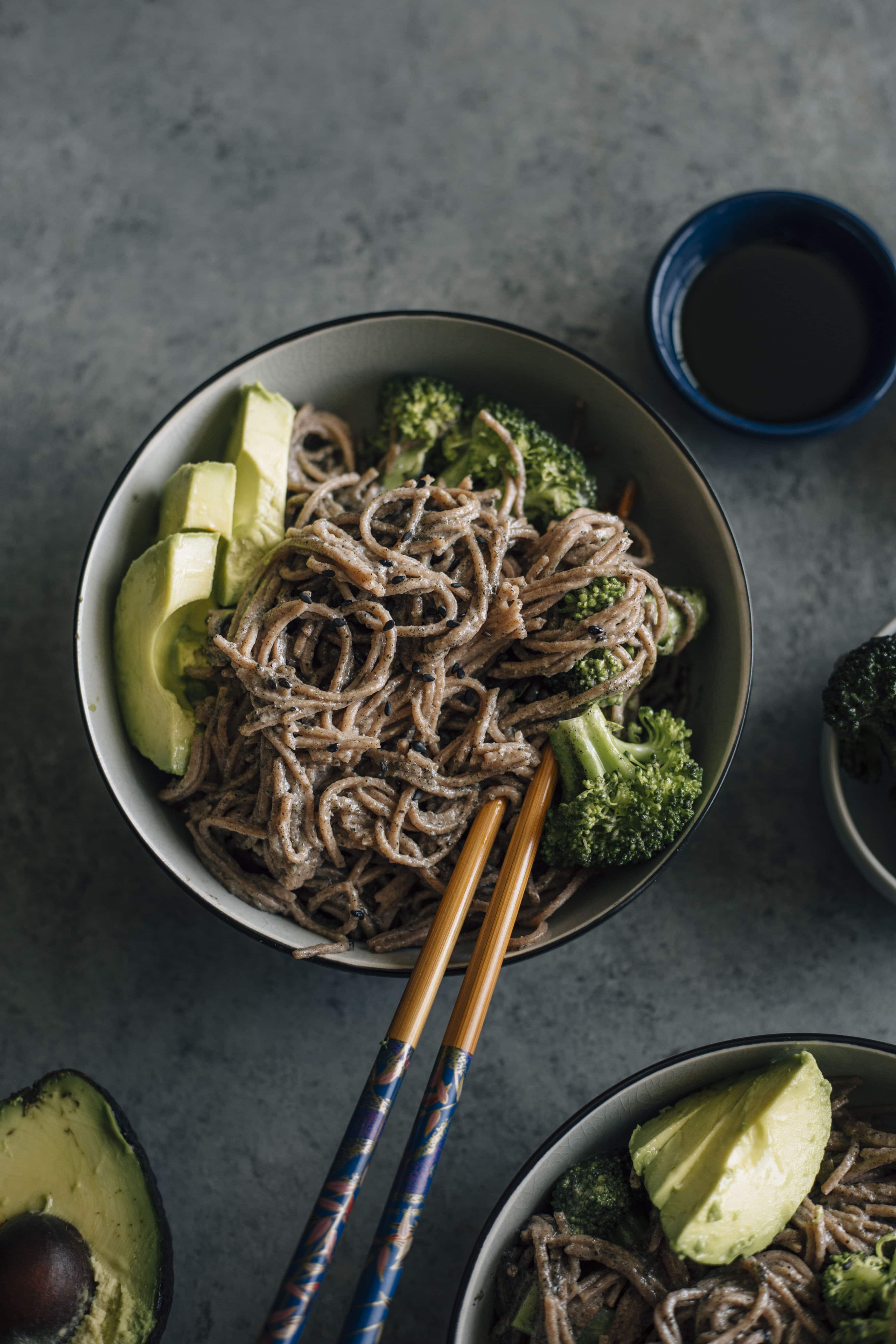 Black Sesame Soba Noodles | Noodles marinated in tahini and topped with broccoli and avocado--creamy with a hint of sweetness to it