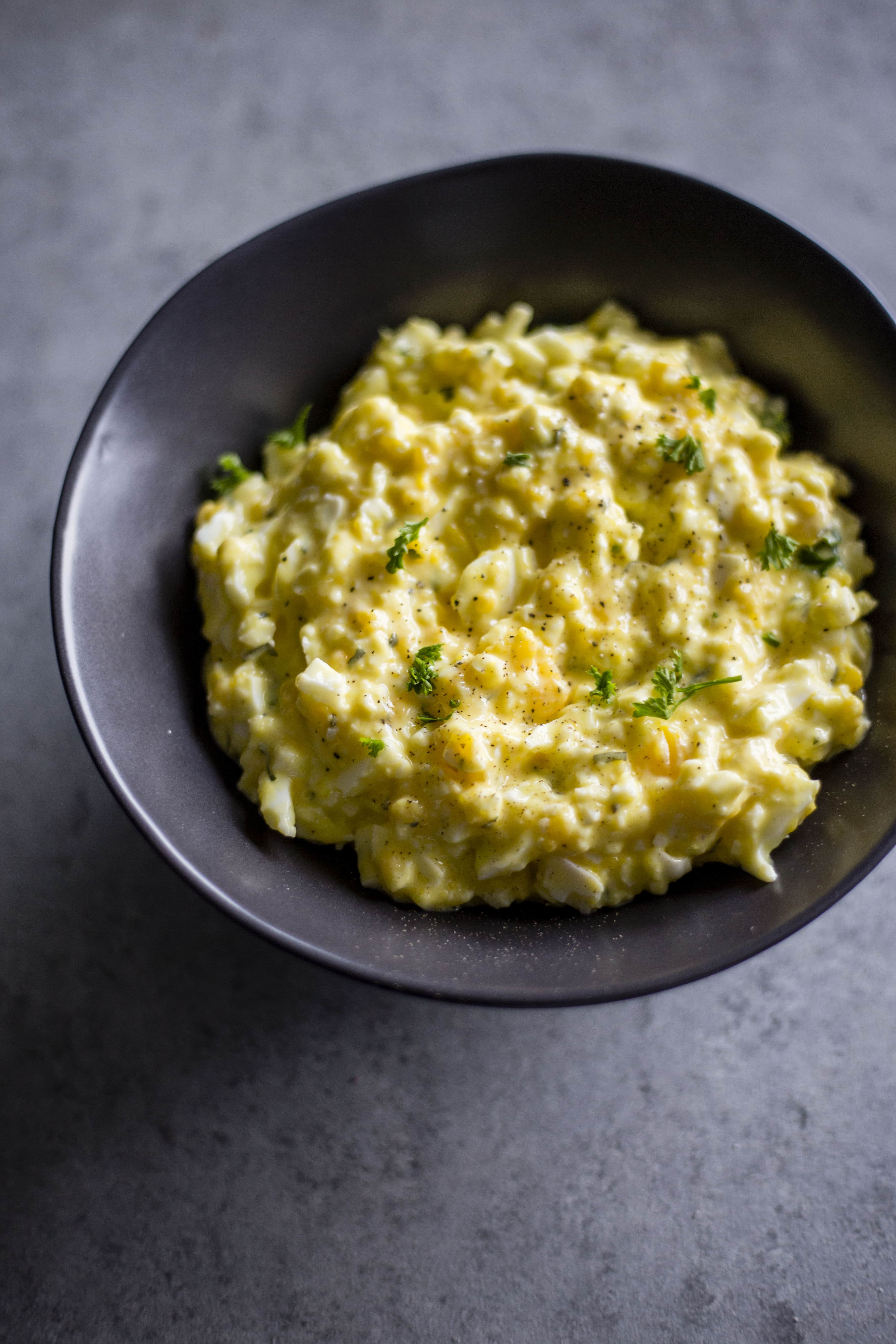 Soft Boiled Egg Salad | Enjoy your soft boiled eggs in egg salad form! Combined with Greek yogurt for a healthier meal option | thealmondeater.com