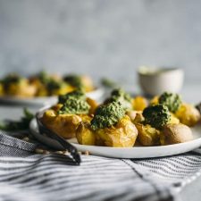 Pesto Smashed Potatoes | Crispy smashed potatoes topped with a vegan-friendly kale pesto!