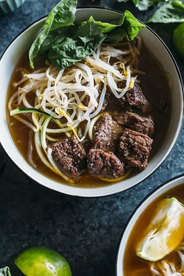 Paleo Beef Pho | A Paleo-friendly pho recipes that uses zucchini and kelp noodles in place of rice noodles and is Whole30 compliant, too! | thealmondeater.com