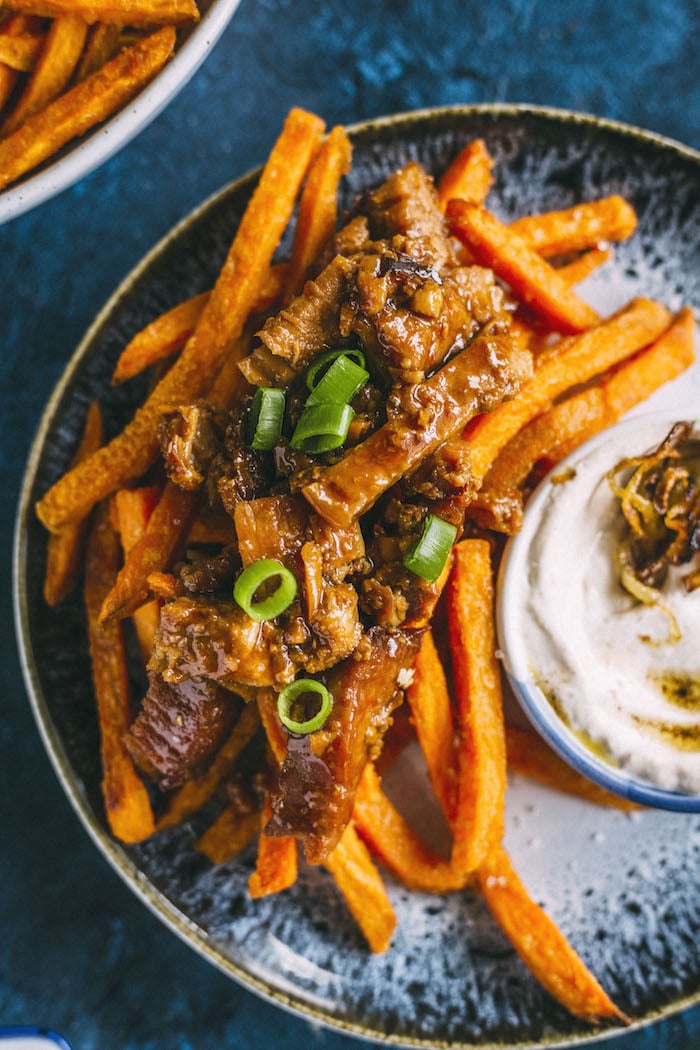 loaded fries topped with honey ginger pork+caramelized onion dip