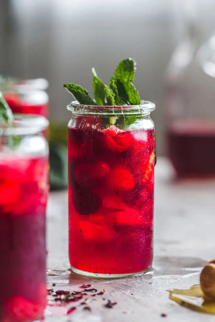 Raspberry Hibiscus Iced Team with mint and honey | thealmondeater.com