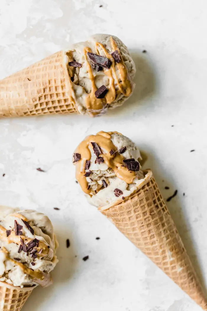 Three cones of banana ice cream