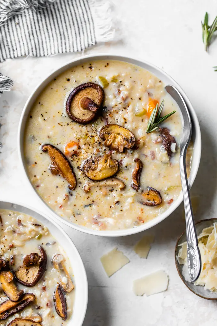 bowl of soup with rice and mushrooms