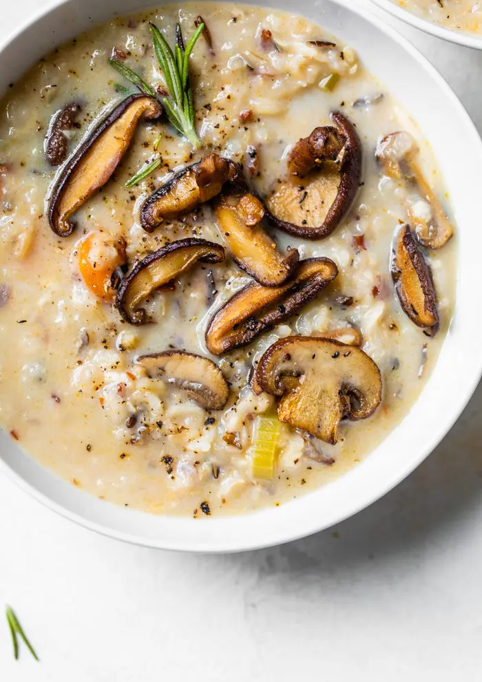 soup in a bowl topped with mushrooms