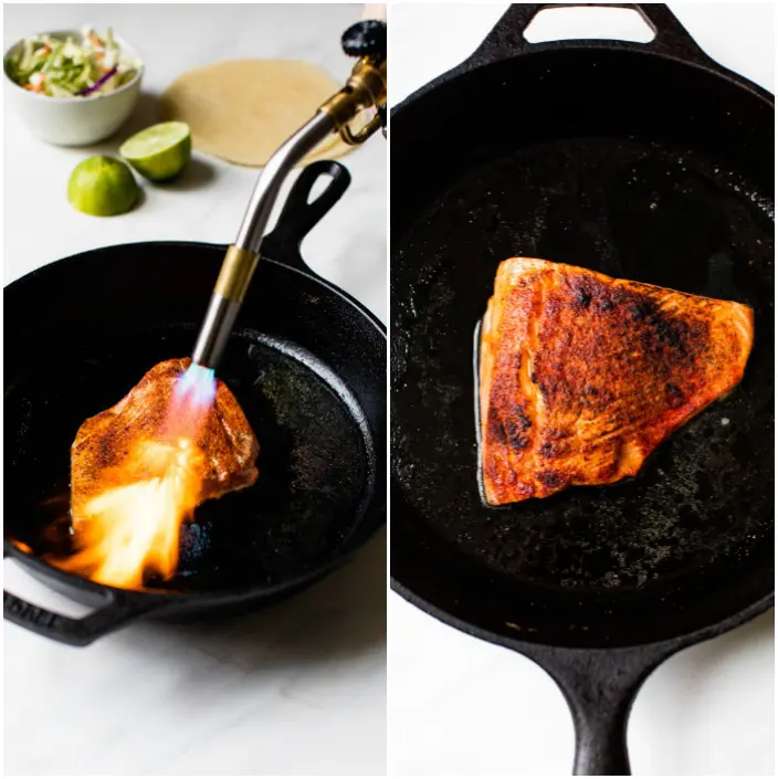 charred salmon in a skillet