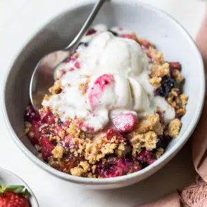berries and ice cream in a bowl