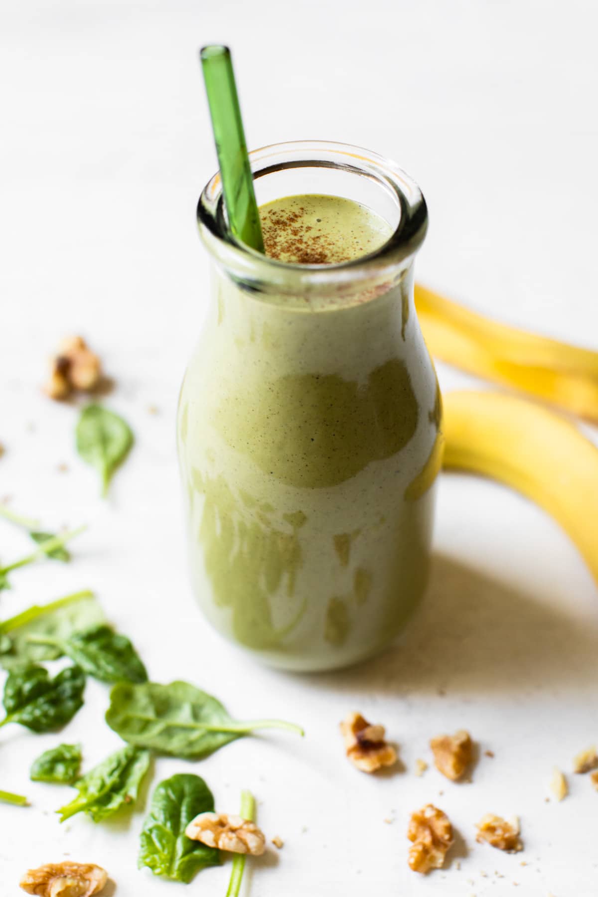 green smoothie in a glass jar