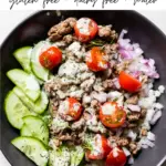 bowl with lamb, cucumber, tomatoes and red onion with text overlay