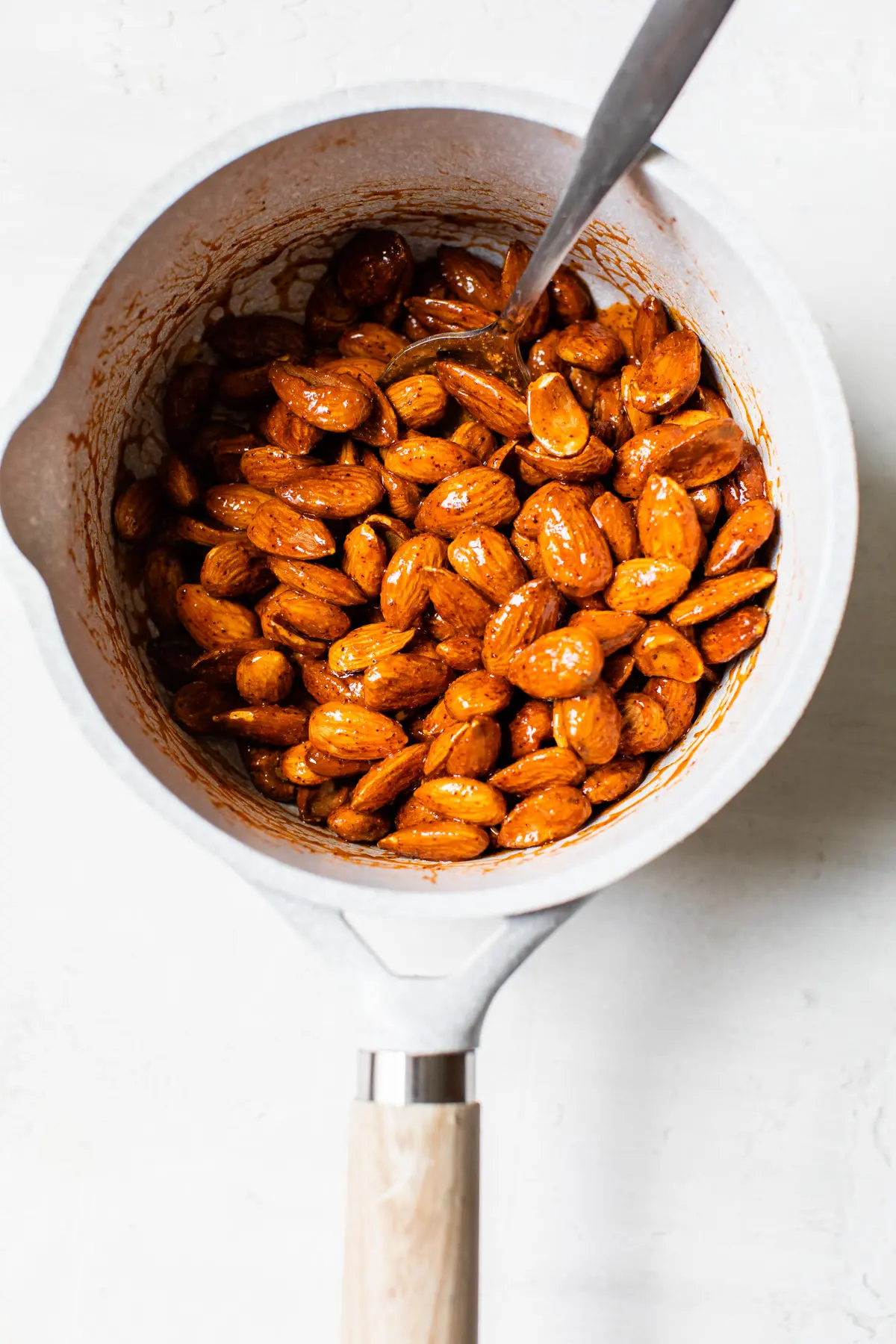 almonds covered in buffalo sauce