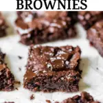 brownies on parchment paper with text overlay