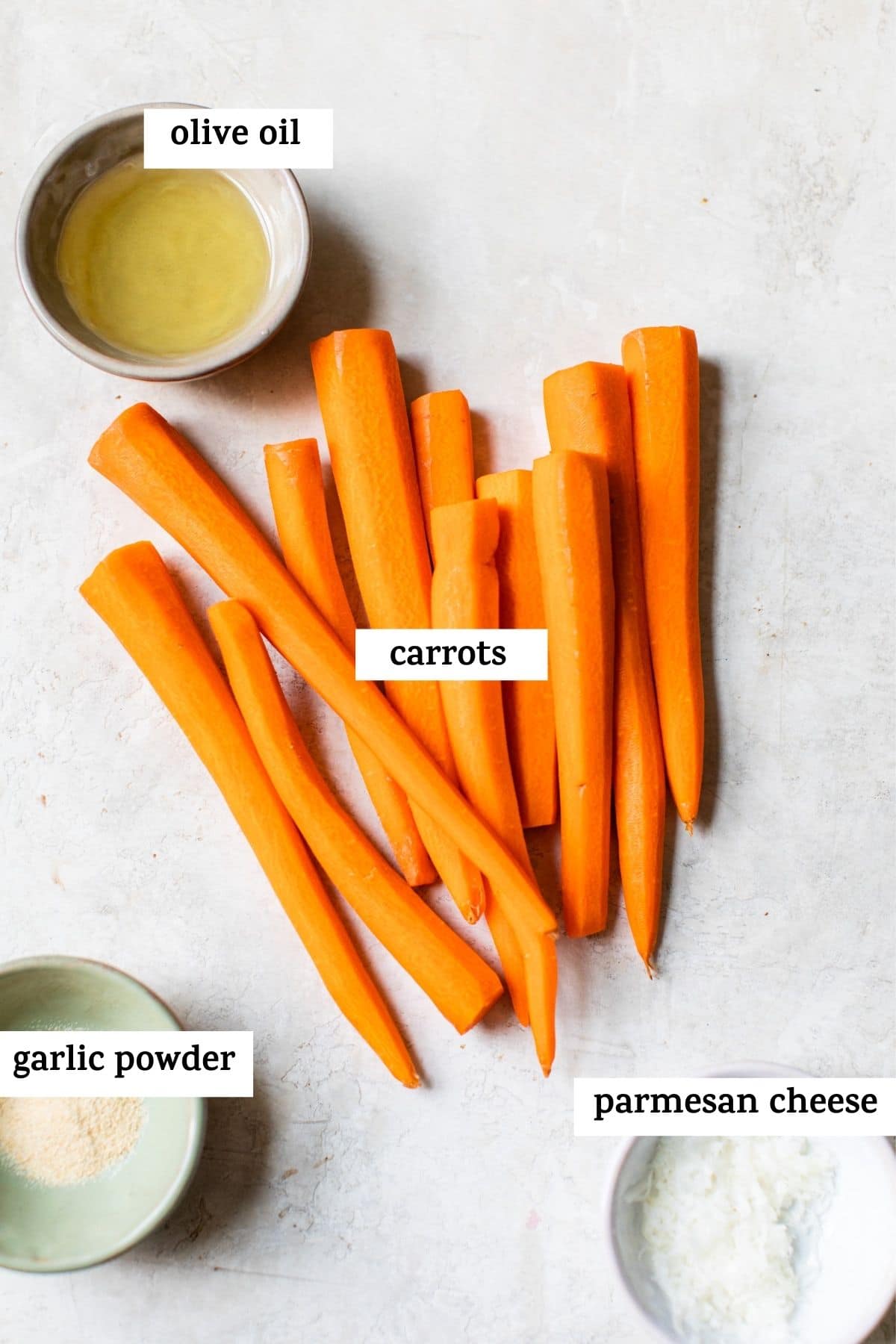 carrots, oil, cheese, and garlic powder with text overlay