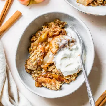 bowl with apples, oats and vanilla ice cream
