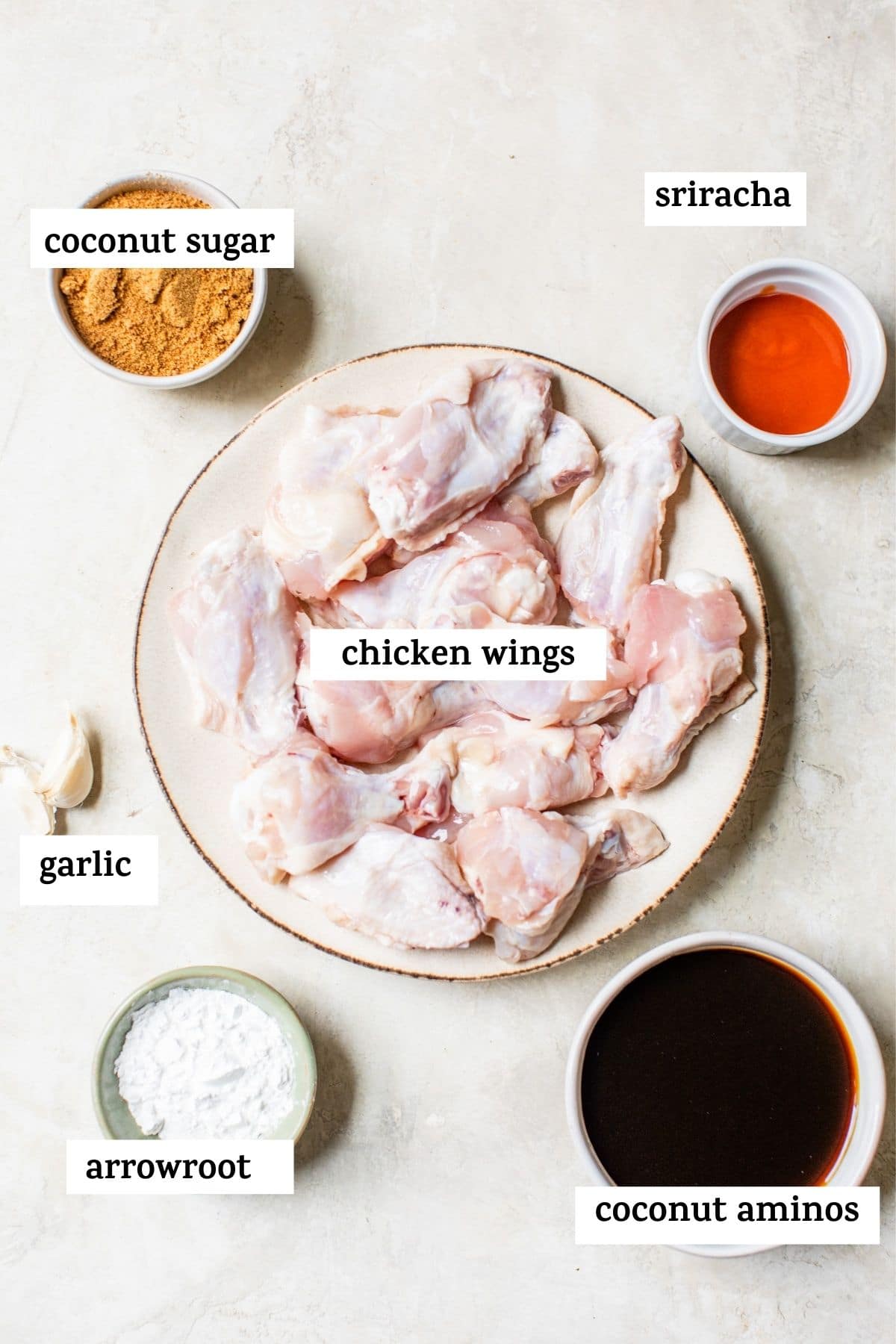 chicken wing ingredients on a board