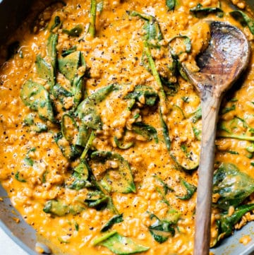 farro, spinach and sweet potato in a skillet