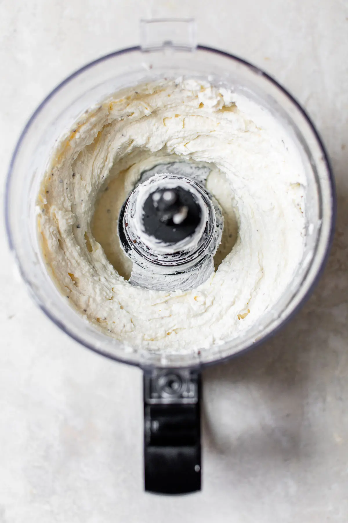 whipped cheese in a food processor