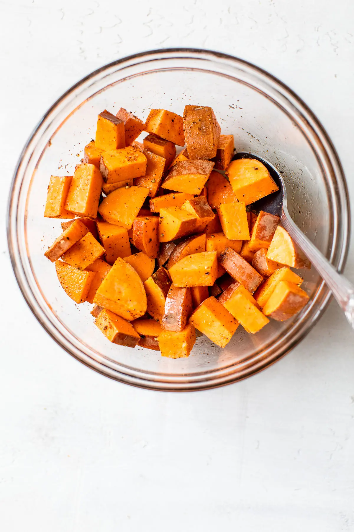 diced sweet potatoes in a glass bowl