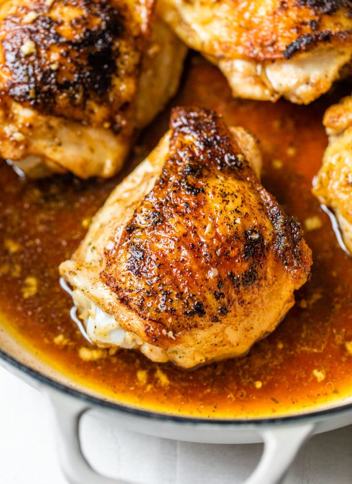 cook chicken thighs with skin in a skillet