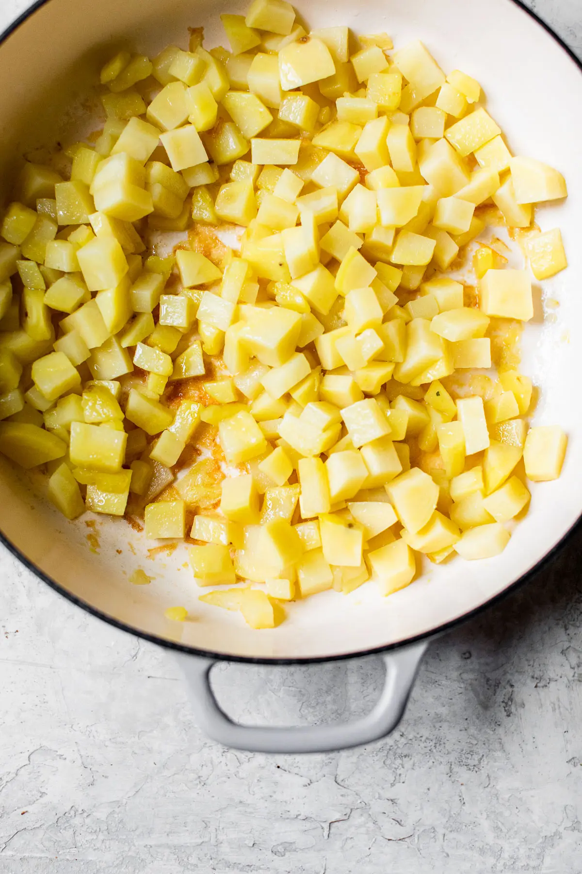 diced potatoes in a skillet