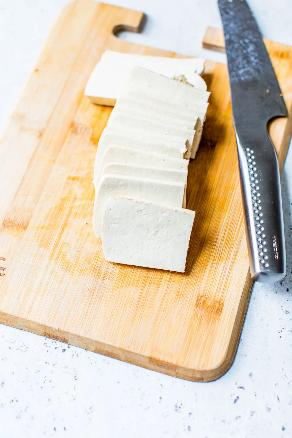 sliced tofu on a cutting board