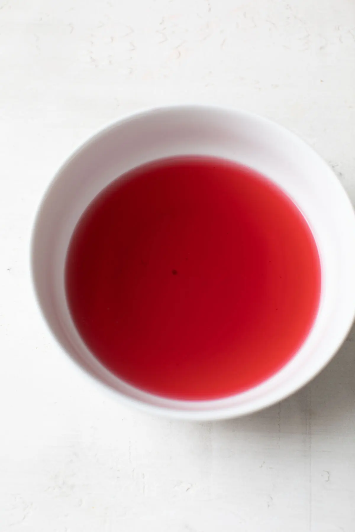 brewed hibiscus tea in a bowl