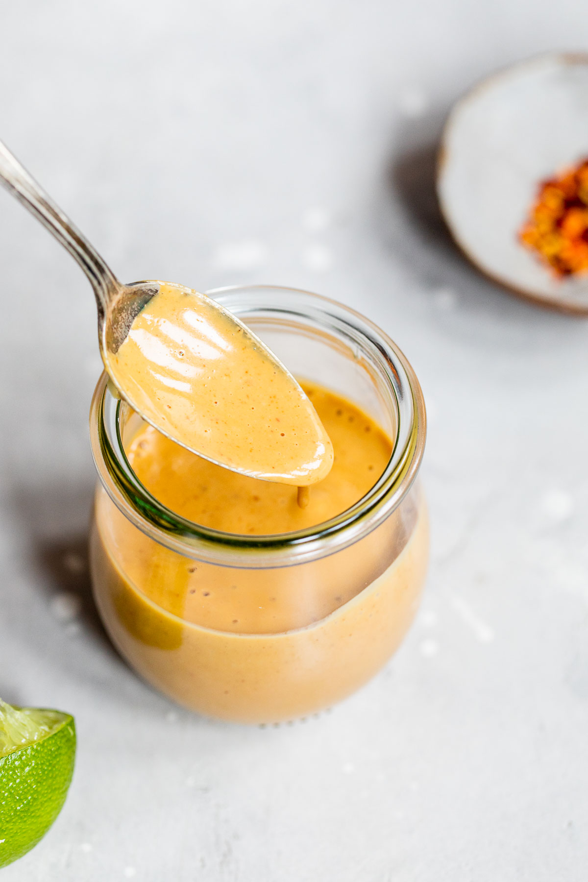 orange dipping sauce in a jar