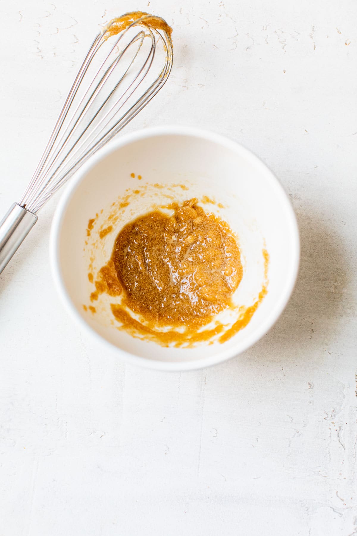 whisked butter and brown sugar in a bowl