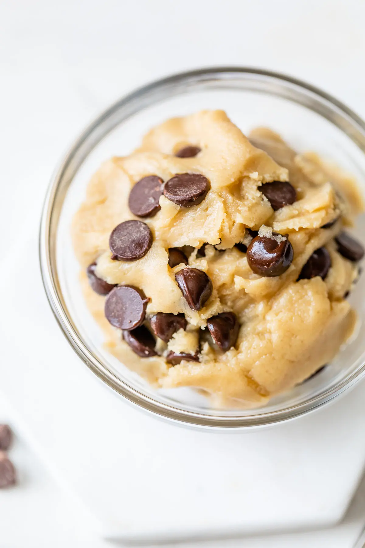 chocolate chip cookie dough in a small glass bowl