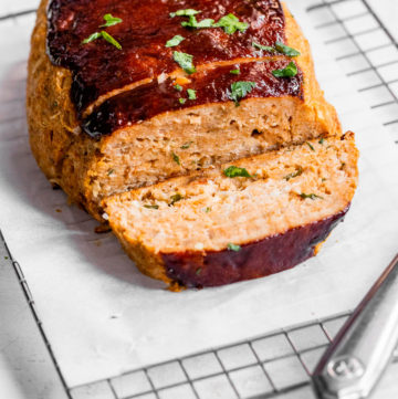 sliced meatloaf on a piece of parchment paper