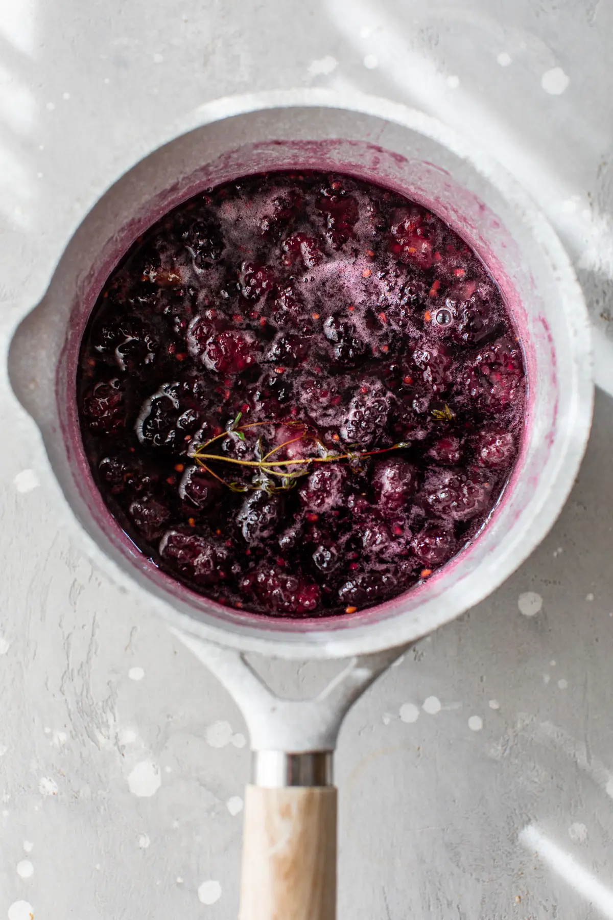 blackberry simple syrup in a small saucepan