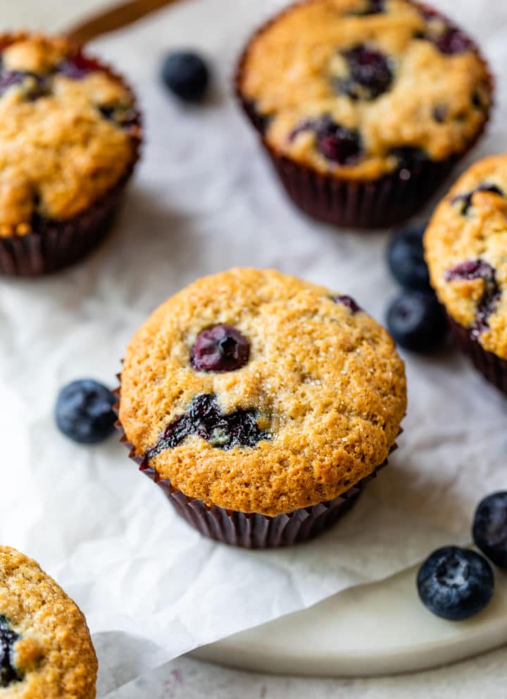 blueberry muffins on parchment paper
