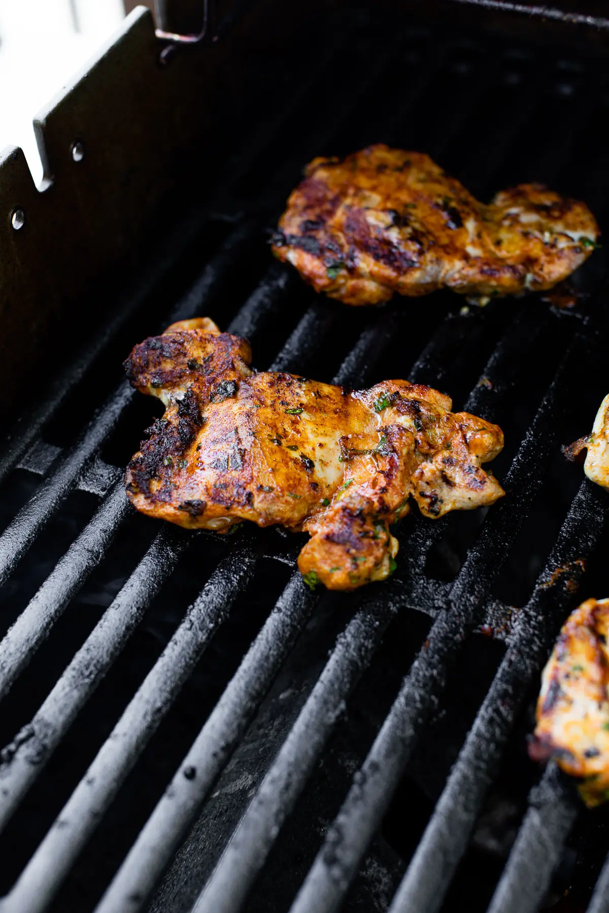 grilled boneless skinless chicken thighs on the grill