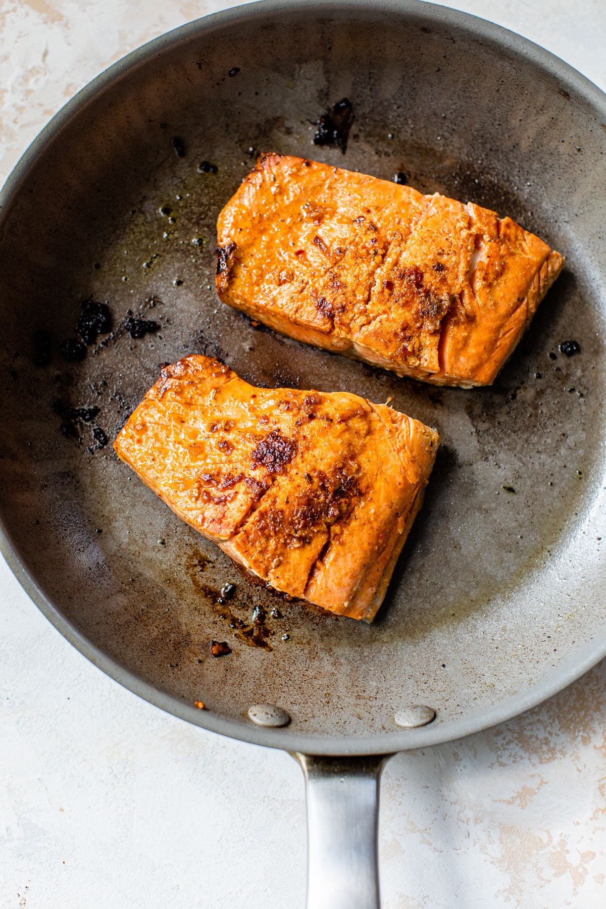 cooked salmon in a skillet