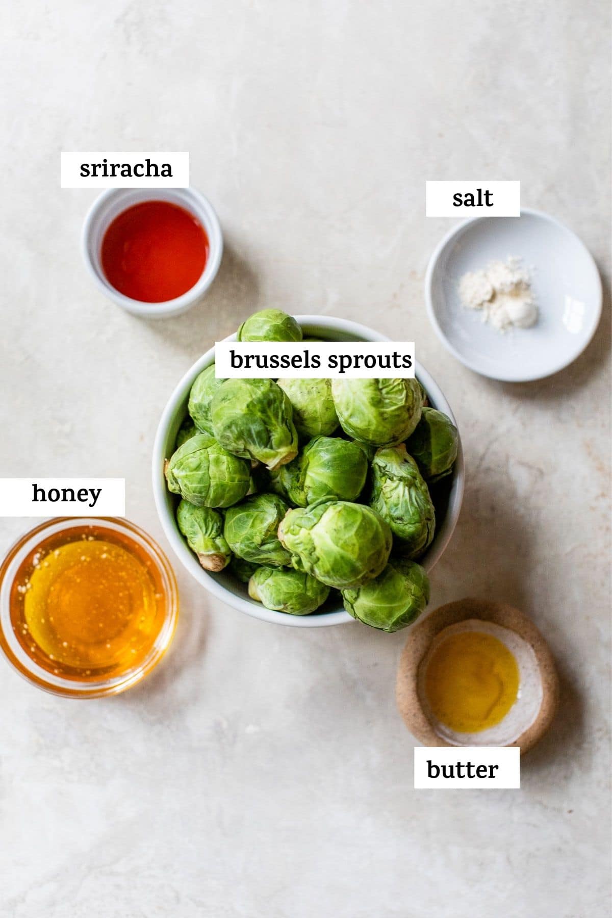 brussels sprouts in a bowl with text overlay