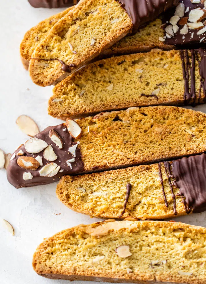 close up photo of biscotti topped with almonds