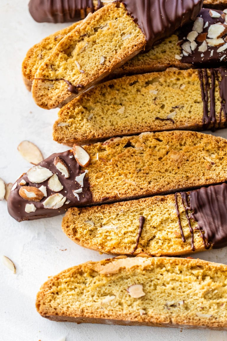 close up photo of biscotti topped with almonds