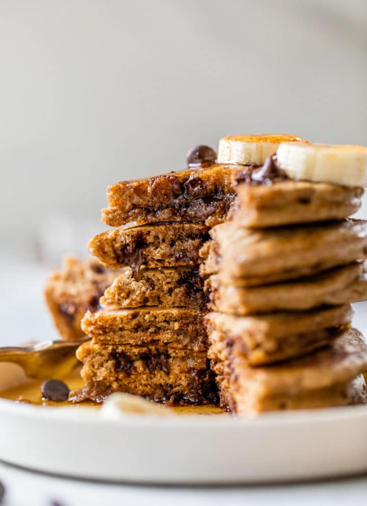 a stack of pancakes loaded with chocolate chips