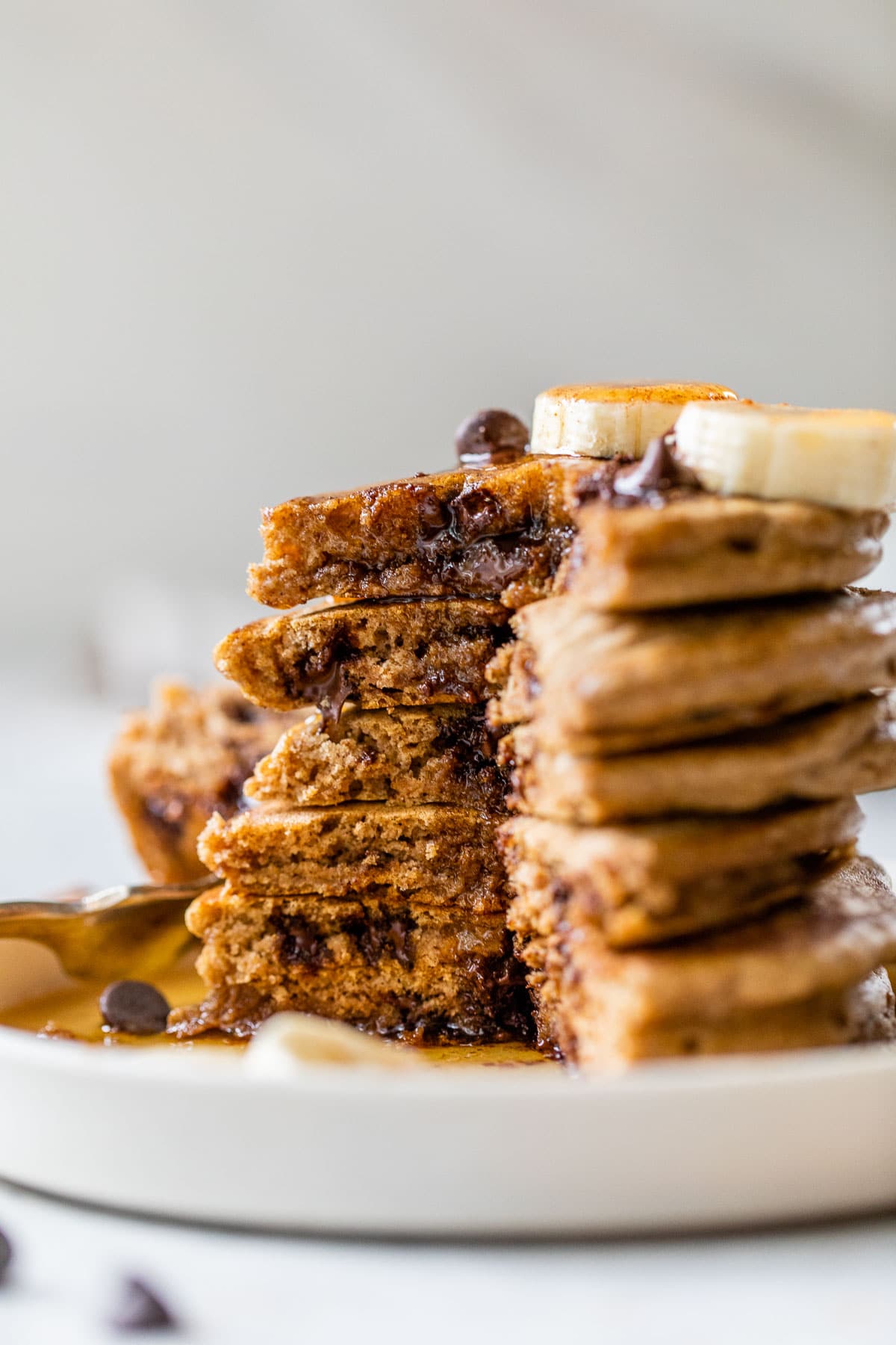 a stack of pancakes loaded with chocolate chips