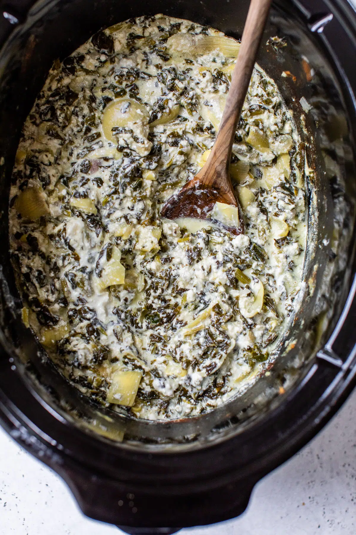 creamy spinach artichoke dip in the crockpot