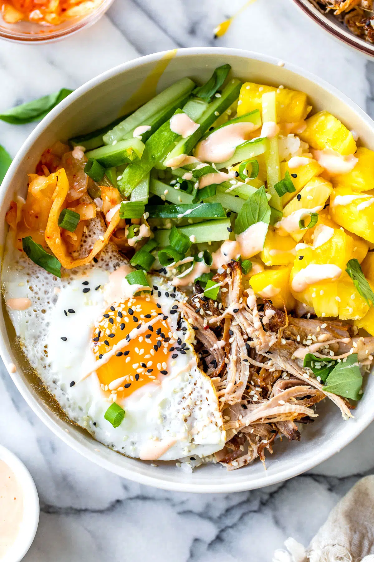 bibimbap with pineapple and a fried egg