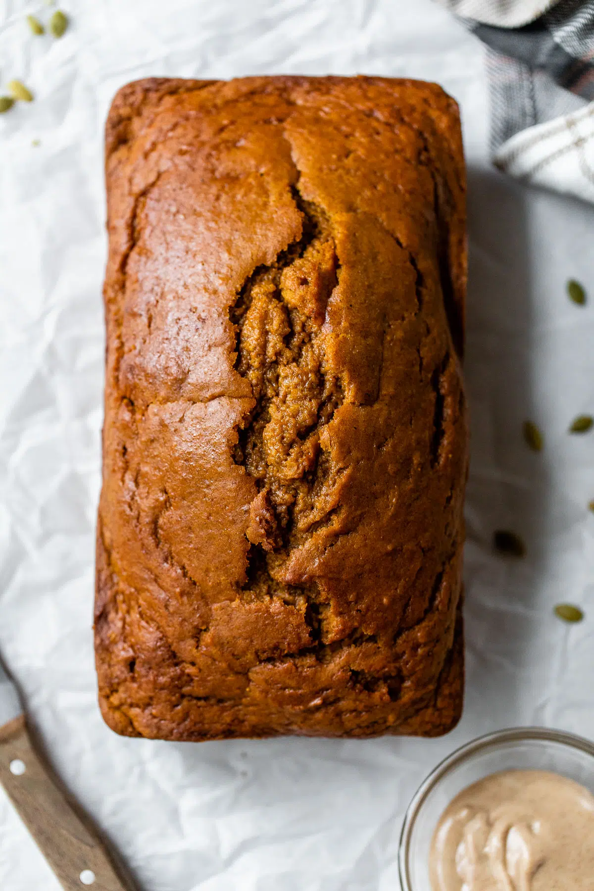 baked pumpkin bread on parchment paper