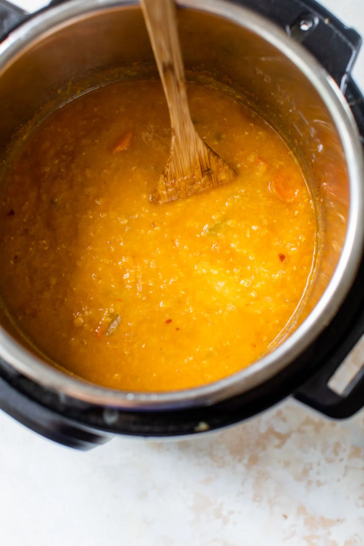 cooked lentil soup in a pressure cooker