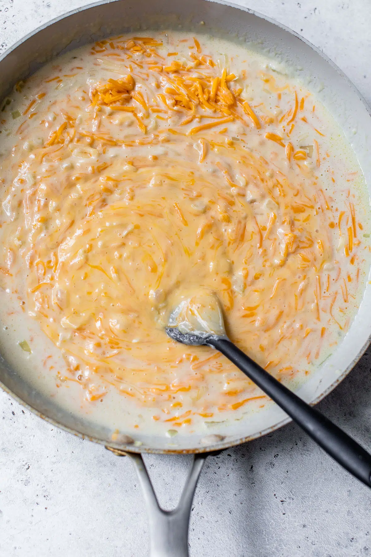 cheese sauce in a skillet