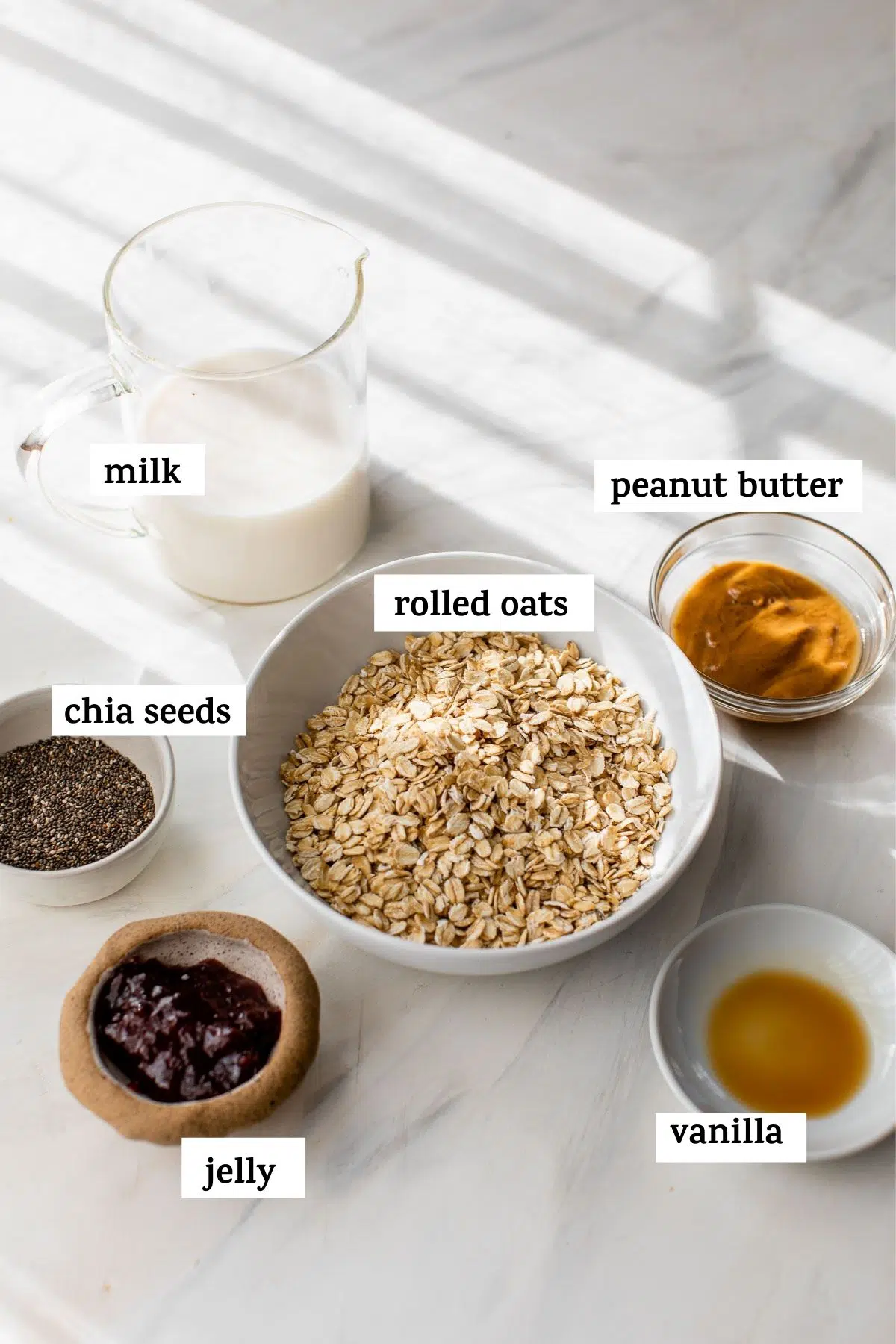 ingredients to make overnight oats on a table with text overlay