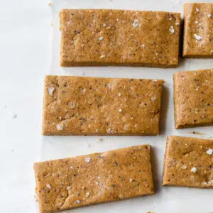almond butter bars on parchment paper