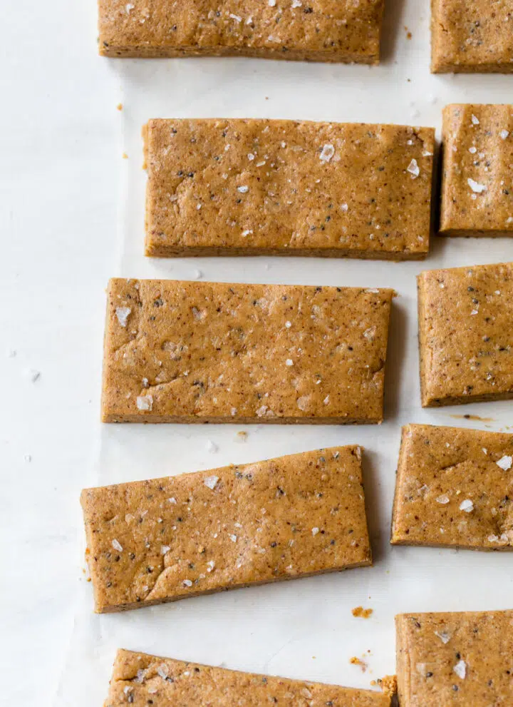 almond butter bars on parchment paper