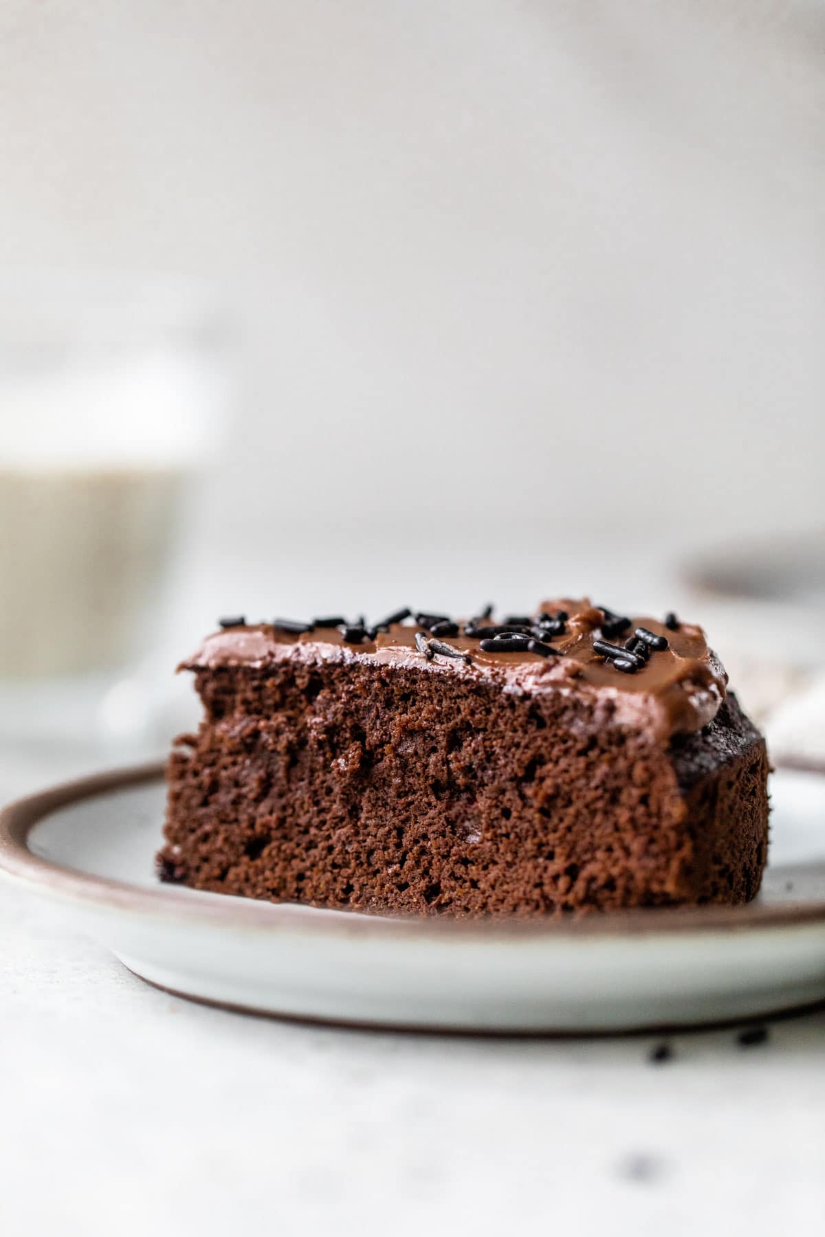 a slice of chocolate cake on a small plate