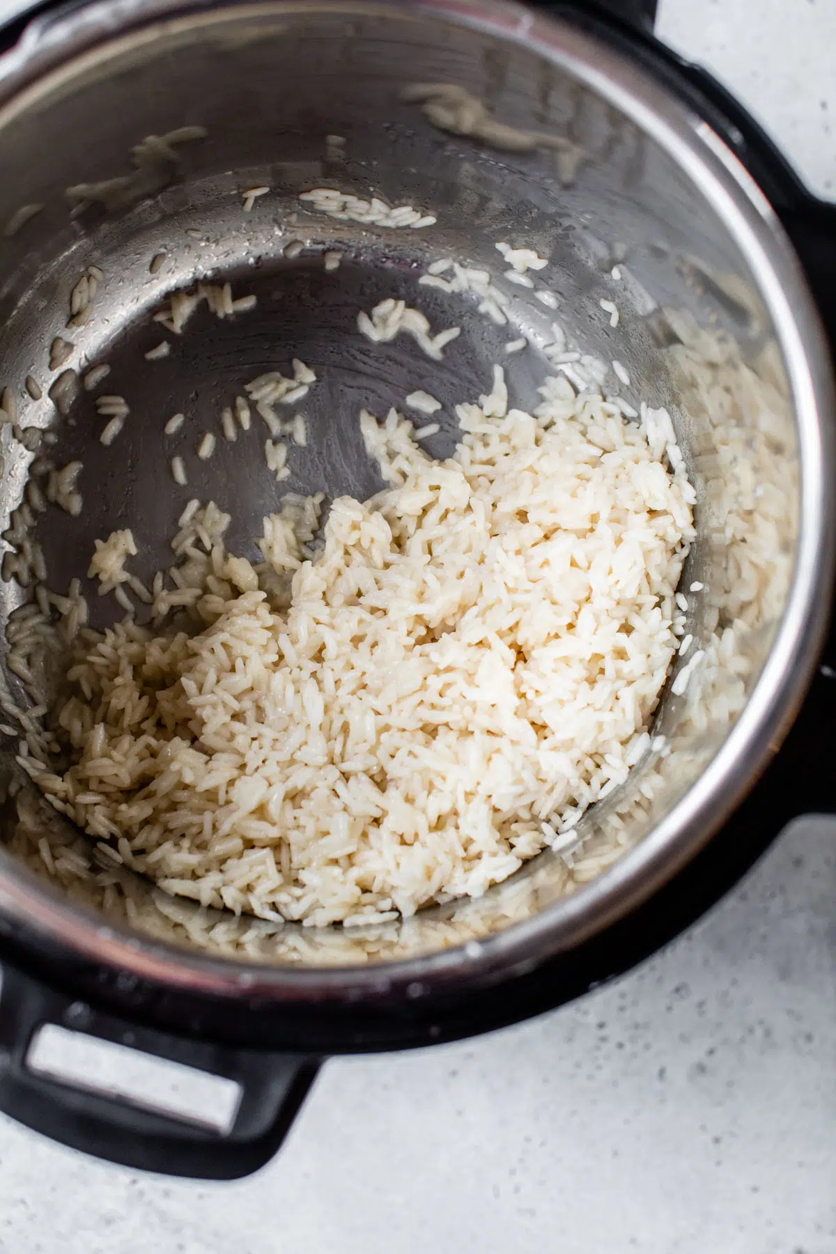 cooked coconut rice in a pressure cooker