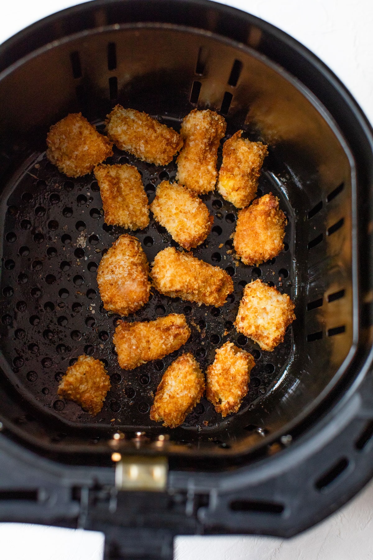 breaded chicken nuggets in an air fryer